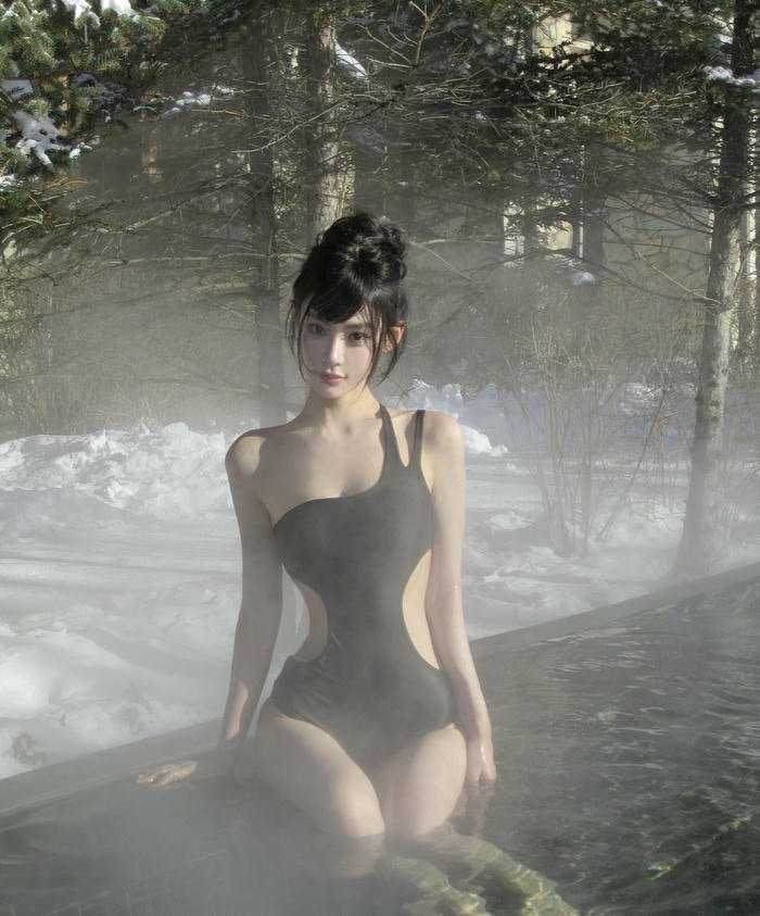 hình gái xinh mặc bikini màu đen kỳ nghỉ