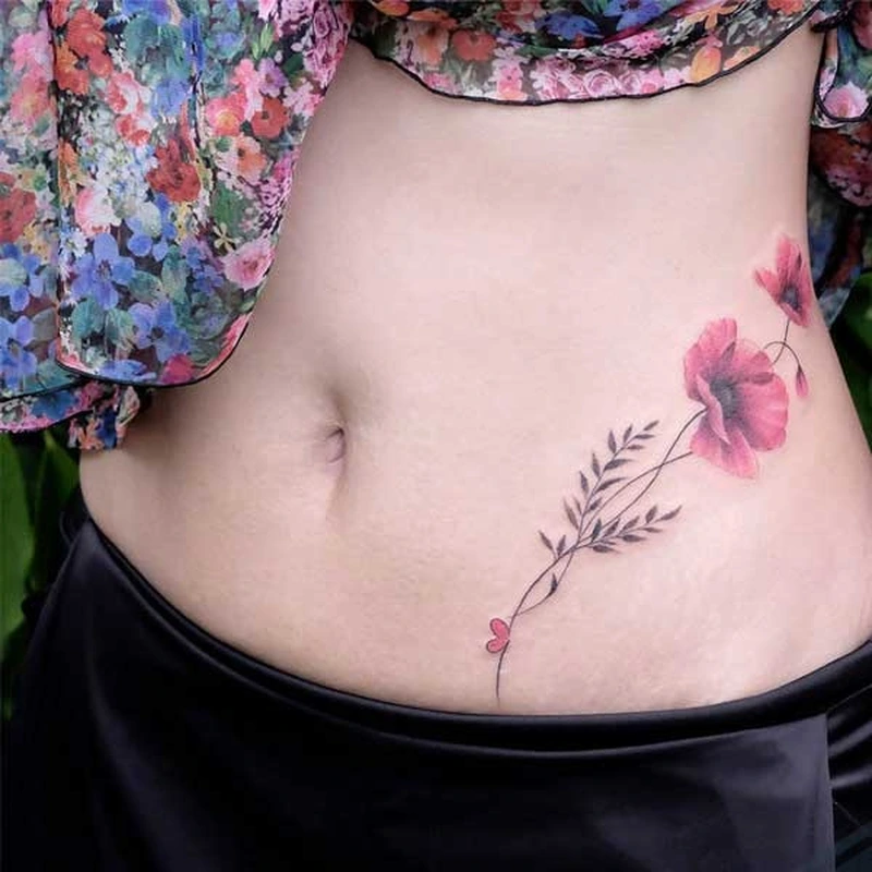 Tham khảo tattoo bụng nữ họa tiết lá tạo nét mềm mại