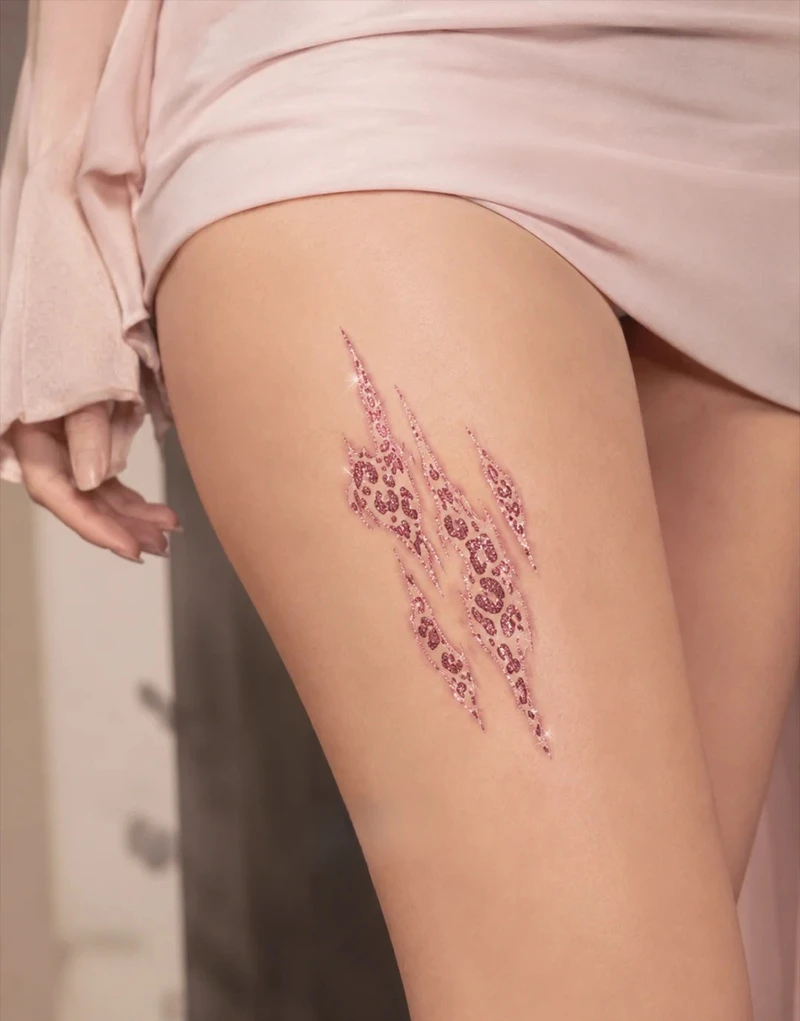 hình xăm bắp chân nữ cá tính sắc nét